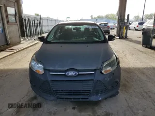 2013 Ford Focus SE z VIN 1FADP3F26DL106275, wystawiony jako Copart lot #55701345 z przebiegiem 117 897 mil mil oraz Szkody całkowita. Historia ofert i sprzedaży dostępna na DreamBid. Obrazek 5.