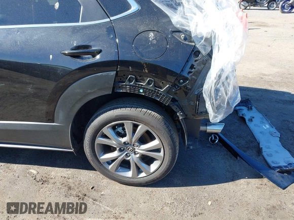 2024 Mazda CX-30 S Carbon Edition with VIN 3MVDMBCM4RM607530, listed as a IAAI auction lot 41796426 with 3,715 mi miles and . Bid and sale history available at DreamBid. Image 18.