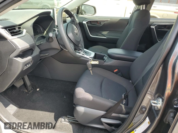 2024 Toyota RAV4 Hybrid LE with VIN JTMMWRFV7RD233242, listed as a Copart auction lot 60878815 with 11,064 mi miles and Salvage title. Bid and sale history available at DreamBid. Image 7.