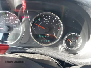 2017 Jeep Wrangler Unlimited Sport with VIN 1C4BJWDG1HL709191, listed as a IAAI auction lot 41360554 with 64,527 mi miles. Bid and sale history available at carsss.com. Image 7.