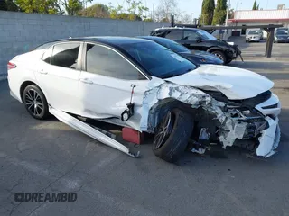 2019 Toyota Camry LE z VIN 4T1B11HK4KU703416, wystawiony jako IAAI lot #41691292 z przebiegiem 119 476 mil mil oraz . Historia ofert i sprzedaży dostępna na DreamBid. Obrazek 1.
