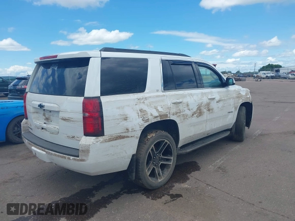 2020 Chevrolet Tahoe LT with VIN 1GNSKBKC6LR256298, listed as a IAAI auction lot 39807928 with Not provided miles and . Bid and sale history available at DreamBid. Image 4.