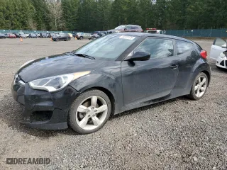 2014 Hyundai Veloster with VIN KMHTC6AD1EU186166, listed as a Copart auction lot 50207375 with 102,695 mi miles and Salvage Title. Bid and sale history available at carsss.com. Image 1.