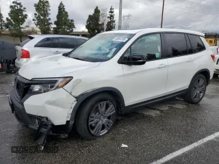 2020 Honda Passport EX-L with VIN 5FNYF7H57LB000500, listed as a Copart auction lot 48004785 with 20,643 mi miles and Salvage Title. Bid and sale history available at carsss.com. Image 1.