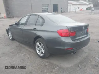 2014 BMW 3 Series 328i xDrive with VIN WBA3B5G57ENS11113, listed as a IAAI auction lot 41865460 with 123,777 mi miles. Bid and sale history available at carsss.com. Image 3.