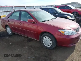 2002 Toyota Camry LE z VIN 4T1BE32K32U080377, wystawiony jako IAAI lot #42193353 z przebiegiem 204 240 mil mil oraz . Historia ofert i sprzedaży dostępna na DreamBid. Obrazek 1.
