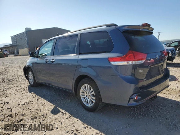 2014 Toyota Sienna XLE with VIN 5TDYK3DC5ES467244, listed as a Copart auction lot 54777445 with 157,503 mi miles and Salvage Title. Bid and sale history available at DreamBid. Image 2.