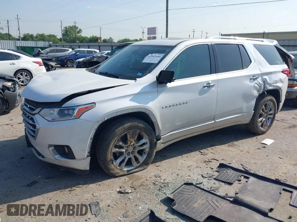 2020 Chevrolet Traverse High Country with VIN 1GNEVNKWXLJ135322, listed as a IAAI auction lot 42042466 with 105,748 mi miles and . Bid and sale history available at DreamBid. Image 2.