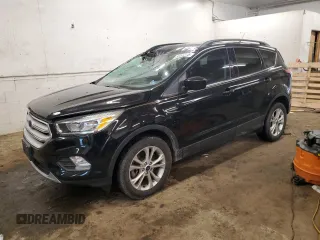 2018 Ford Escape SE z VIN 1FMCU9GD0JUD15580, wystawiony jako Copart lot #60490305 z przebiegiem 76 911 mil mil oraz Czysty tytuł • Clean title. Historia ofert i sprzedaży dostępna na DreamBid. Obrazek 1.