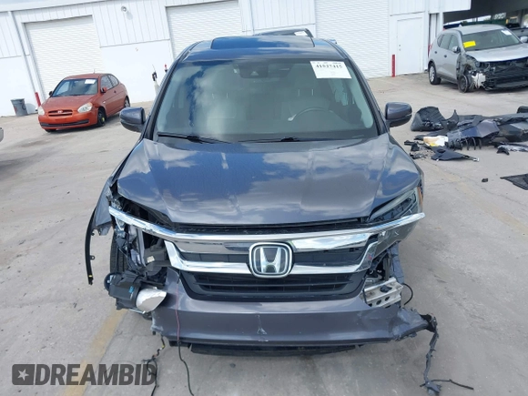 2020 Honda Pilot EX-L with VIN 5FNYF5H59LB014497, listed as a IAAI auction lot 41527415 with 66,625 mi miles. Bid and sale history available at carsss.com. Image 13.