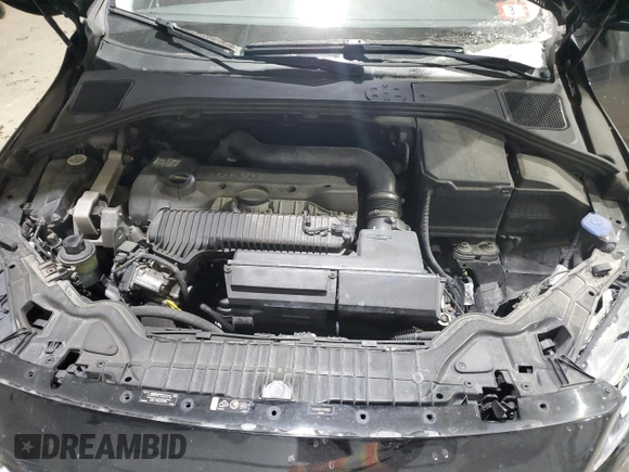 2015 Volvo V60 T5 z VIN YV4612HK1F1001506, wystawiony jako Copart lot #86145044 z przebiegiem 154 826 mil mil oraz Szkoda całkowita • Salvage title. Historia ofert i sprzedaży dostępna na DreamBid. Obrazek 12.