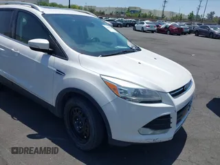 2015 Ford Escape Titanium with VIN 1FMCU0J92FUB25268, listed as a IAAI auction lot 42489681 with 139,809 mi miles and . Bid and sale history available at DreamBid. Image 1.
