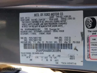 2011 Ford Fusion SE with VIN 3FAHP0HA8BR301894, listed as a IAAI auction lot 41804881 with 150,504 mi miles. Bid and sale history available at carsss.com. Image 9.