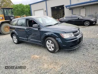2013 Dodge Journey American Value with VIN 3C4PDCAB6DT577273, listed as a Copart auction lot 50627295 with 139,775 mi miles and Salvage title. Bid and sale history available at DreamBid. Image 11.