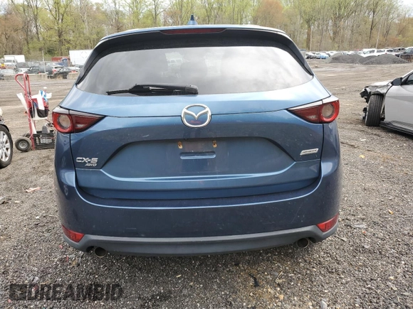 2017 Mazda CX-5 Touring with VIN JM3KFBCL3H0163513, listed as a Copart auction lot 53090045 with 151,675 mi miles and Clean Title. Bid and sale history available at carsss.com. Image 6.