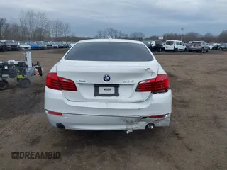 2014 BMW 5 Series 535i xDrive with VIN WBA5B3C57ED537549, listed as a IAAI auction lot 41047583 with 69,005 mi miles and . Bid and sale history available at carsss.com. Image 16.