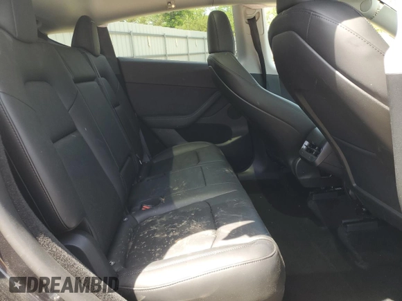 2024 Tesla Model Y with VIN 7SAYGDED6RF091715, listed as a Copart auction lot 56535585 with 23,120 mi miles and Salvage title. Bid and sale history available at DreamBid. Image 10.
