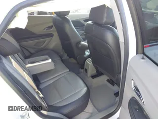 2016 Buick Encore Premium with VIN KL4CJDSB1GB647306, listed as a IAAI auction lot 41983159 with 59,592 mi miles. Bid and sale history available at carsss.com. Image 8.