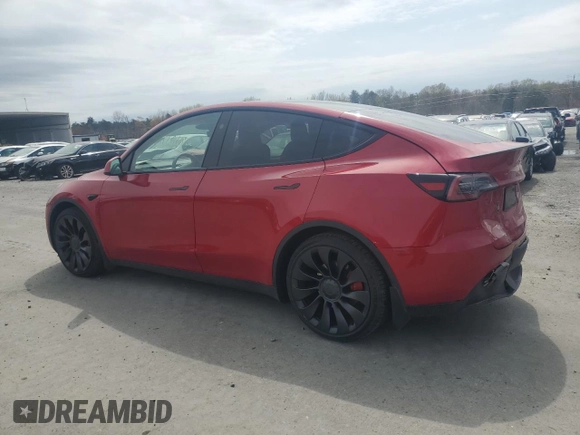 2023 Tesla Model Y Performance with VIN 7SAYGDEF4PF960357, listed as a Copart auction lot 51126105 with 37,252 mi miles and Salvage Title. Bid and sale history available at DreamBid. Image 2.