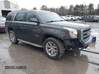 2019 GMC Yukon SLE with VIN 1GKS2AKC1KR385085, listed as a IAAI auction lot 41699370 with 83,889 mi miles. Bid and sale history available at carsss.com. Image 1.