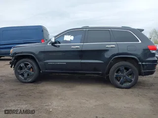2014 Jeep Grand Cherokee Overland with VIN 1C4RJFCG6EC121654, listed as a IAAI auction lot 42051730 with 163,853 mi miles. Bid and sale history available at carsss.com. Image 14.