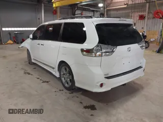 2014 Toyota Sienna SE with VIN 5TDXK3DC7ES497390, listed as a IAAI auction lot 42037096 with 169,127 mi miles and . Bid and sale history available at DreamBid. Image 3.