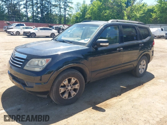 2009 Kia Borrego LX with VIN KNDJJ741395033538, listed as a IAAI auction lot 42088382 with 119,225 mi miles. Bid and sale history available at carsss.com. Image 2.