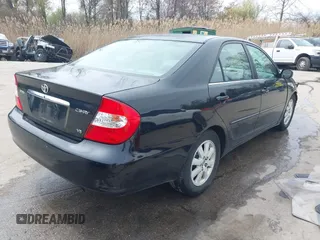 2004 Toyota Camry LE with VIN 4T1BF30K34U080477, listed as a IAAI auction lot 41956998 with 135,441 mi miles. Bid and sale history available at carsss.com. Image 4.