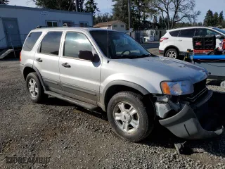 2003 Ford Escape XLT Popular 2 with VIN 1FMYU93193KC40989, listed as a Copart auction lot 50424235 with 92,238 mi miles and Salvage Title. Bid and sale history available at carsss.com. Image 4.