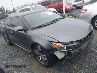 2016 Scion tC z VIN JTKJF5C73GJ022192, wystawiony jako IAAI lot #41228916 z przebiegiem 128 074 mil mil oraz . Historia ofert i sprzedaży dostępna na DreamBid. Obrazek 1.