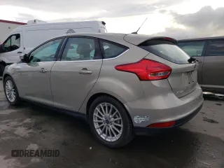 2015 Ford Focus Electric z VIN 1FADP3R43FL314971, wystawiony jako Copart lot #81186143 z przebiegiem 60 987 mil mil oraz . Historia ofert i sprzedaży dostępna na DreamBid. Obrazek 2.