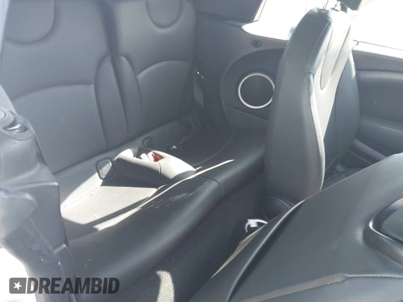 2013 MINI Convertible with VIN WMWZN3C58DT568824, listed as a IAAI auction lot 41998124 with 134,191 mi miles and . Bid and sale history available at DreamBid. Image 8.