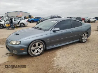 2006 Pontiac GTO z VIN 6G2VX12U06L550451, wystawiony jako Copart lot #54823105 z przebiegiem 273 049 mil mil oraz Tytuł czysty. Historia ofert i sprzedaży dostępna na DreamBid. Obrazek 1.