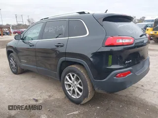 2014 Jeep Cherokee Latitude z VIN 1C4PJMCS5EW219542, wystawiony jako IAAI lot #40950309 z przebiegiem 154 099 mil mil oraz . Historia ofert i sprzedaży dostępna na DreamBid. Obrazek 3.