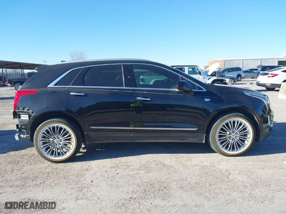 2017 Cadillac XT5 FWD with VIN 1GYKNARS3HZ122969, listed as a IAAI auction lot 41421230 with 116,603 mi miles. Bid and sale history available at carsss.com. Image 13.