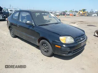 2003 Hyundai Accent with VIN KMHCF35CX3U271513, listed as a IAAI auction lot 42083235 with 166,240 mi miles. Bid and sale history available at carsss.com. Image 1.