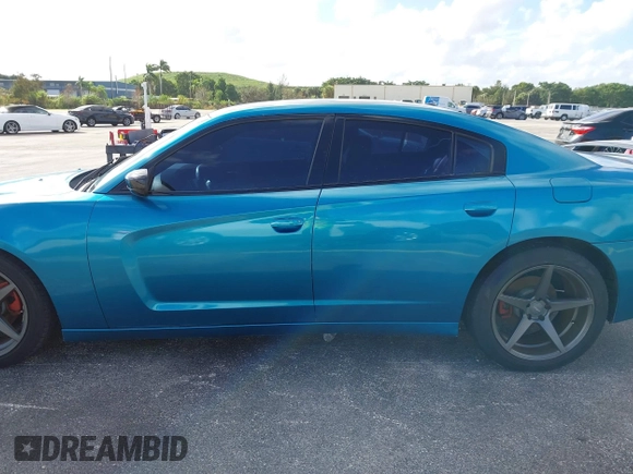 2012 Dodge Charger SXT with VIN 2C3CDXHG0CH185859, listed as a IAAI auction lot 40816799 with 132,572 mi miles. Bid and sale history available at carsss.com. Image 14.