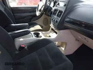 2016 Dodge Grand Caravan SXT with VIN 2C4RDGCG5GR275876, listed as a IAAI auction lot 42121344 with 140,652 mi miles. Bid and sale history available at carsss.com. Image 5.
