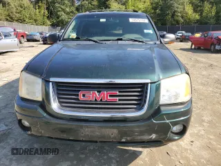 2003 GMC Envoy SLT with VIN 1GKDT13S032396374, listed as a Copart auction lot 74675134 with 115,280 mi miles and Salvage Title. Bid and sale history available at carsss.com. Image 5.