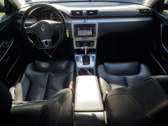 2010 Volkswagen Passat with VIN WVWJM9AN3AE090692, listed as a Copart auction lot 63631585 with 162,379 mi miles and Salvage title. Bid and sale history available at DreamBid. Image 8.