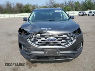 2019 Ford Edge SEL z VIN 2FMPK4J9XKBC67141, wystawiony jako Copart lot #60271615 z przebiegiem 100 400 mil mil oraz Szkoda całkowita • Salvage title. Historia ofert i sprzedaży dostępna na DreamBid. Obrazek 5.