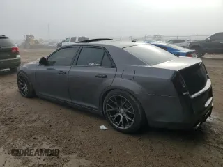 2013 Chrysler 300 with VIN 2C3CCAKT8DH712473, listed as a Copart auction lot 85311994 with 173,640 mi miles and Salvage Title. Bid and sale history available at carsss.com. Image 2.