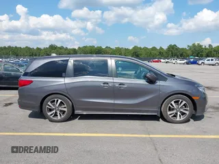 2022 Honda Odyssey Touring с VIN 5FNRL6H86NB026316, выставлен на аукционе IAAI как лот 42611106 с пробегом 75 427 миль миль и . История ставок и продаж доступна на DreamBid. Изображение 13.
