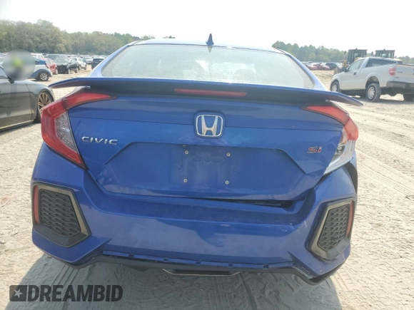 2019 Honda Civic Si with VIN 2HGFC1E52KH702946, listed as a Copart auction lot 53939675 with 64,623 mi miles and Salvage Title. Bid and sale history available at DreamBid. Image 6.