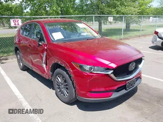 2020 Mazda CX-5 Touring z VIN JM3KFBCM4L0825150, wystawiony jako IAAI lot #42240406 z przebiegiem 21 864 mil mil oraz . Historia ofert i sprzedaży dostępna na DreamBid. Obrazek 1.