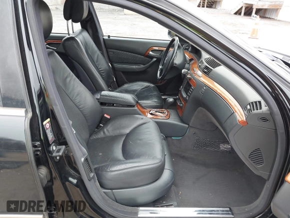 2005 Mercedes-Benz S-Class 4.3L with VIN WDBNG83J15A442273, listed as a IAAI auction lot 41556519 with 222,481 mi miles. Bid and sale history available at carsss.com. Image 5.