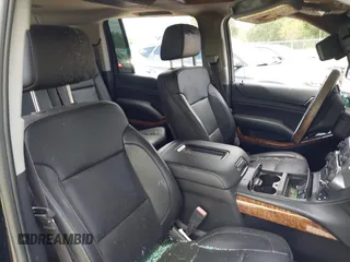 2015 Chevrolet Suburban LTZ with VIN 1GNSCKKC8FR156706, listed as a IAAI auction lot 40638221 with Not Provided miles and . Bid and sale history available at DreamBid. Image 5.