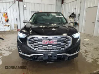 2018 GMC Terrain Denali z VIN 3GKALXEX9JL314152, wystawiony jako Copart lot #56932235 z przebiegiem 83 805 mil mil oraz Czysty tytuł • Clean title. Historia ofert i sprzedaży dostępna na DreamBid. Obrazek 5.