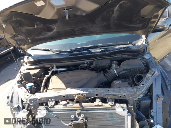 2022 Honda Ridgeline RTL with VIN 5FPYK3F58NB007618, listed as a IAAI auction lot 42258443 with 14,036 mi miles and . Bid and sale history available at DreamBid. Image 10.
