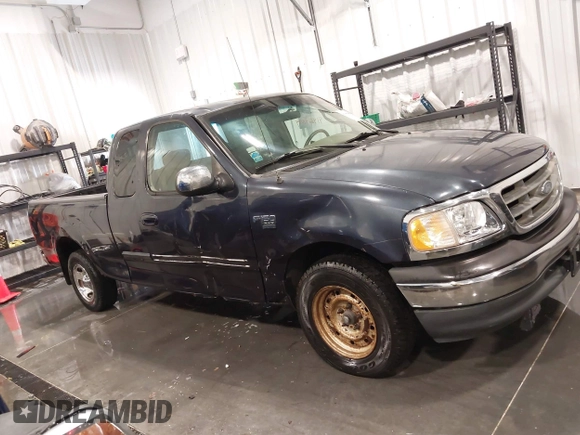 2001 Ford F-150 XL z VIN 1FTRX17L61NB44147, wystawiony jako IAAI lot #41464804 z przebiegiem 130 860 mil mil oraz . Historia ofert i sprzedaży dostępna na DreamBid. Obrazek 14.